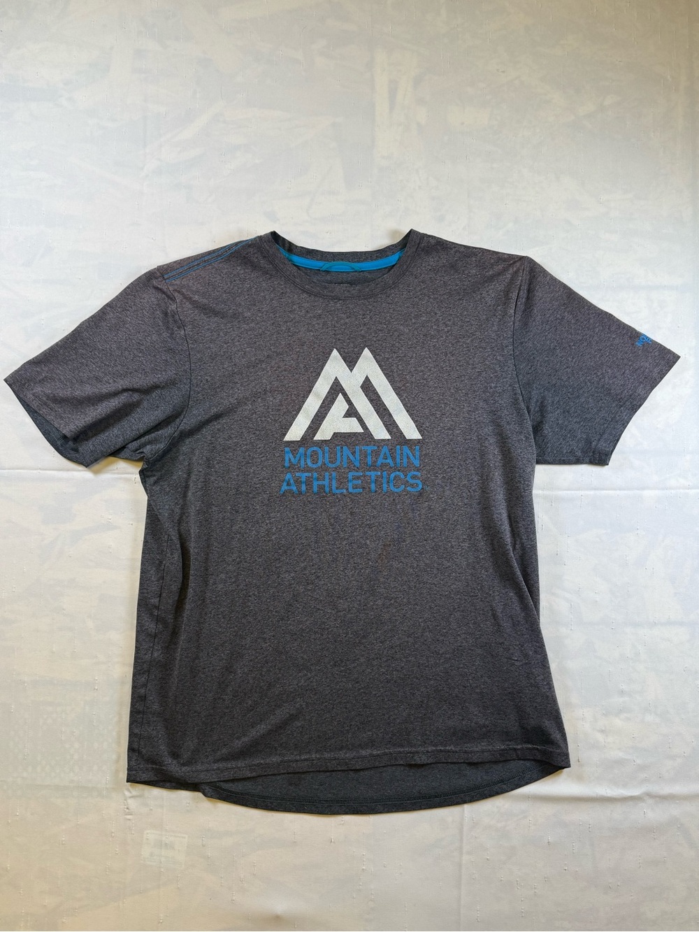 The North Face Men's Short Sleeve Tee in Charcoal with Blue Logo